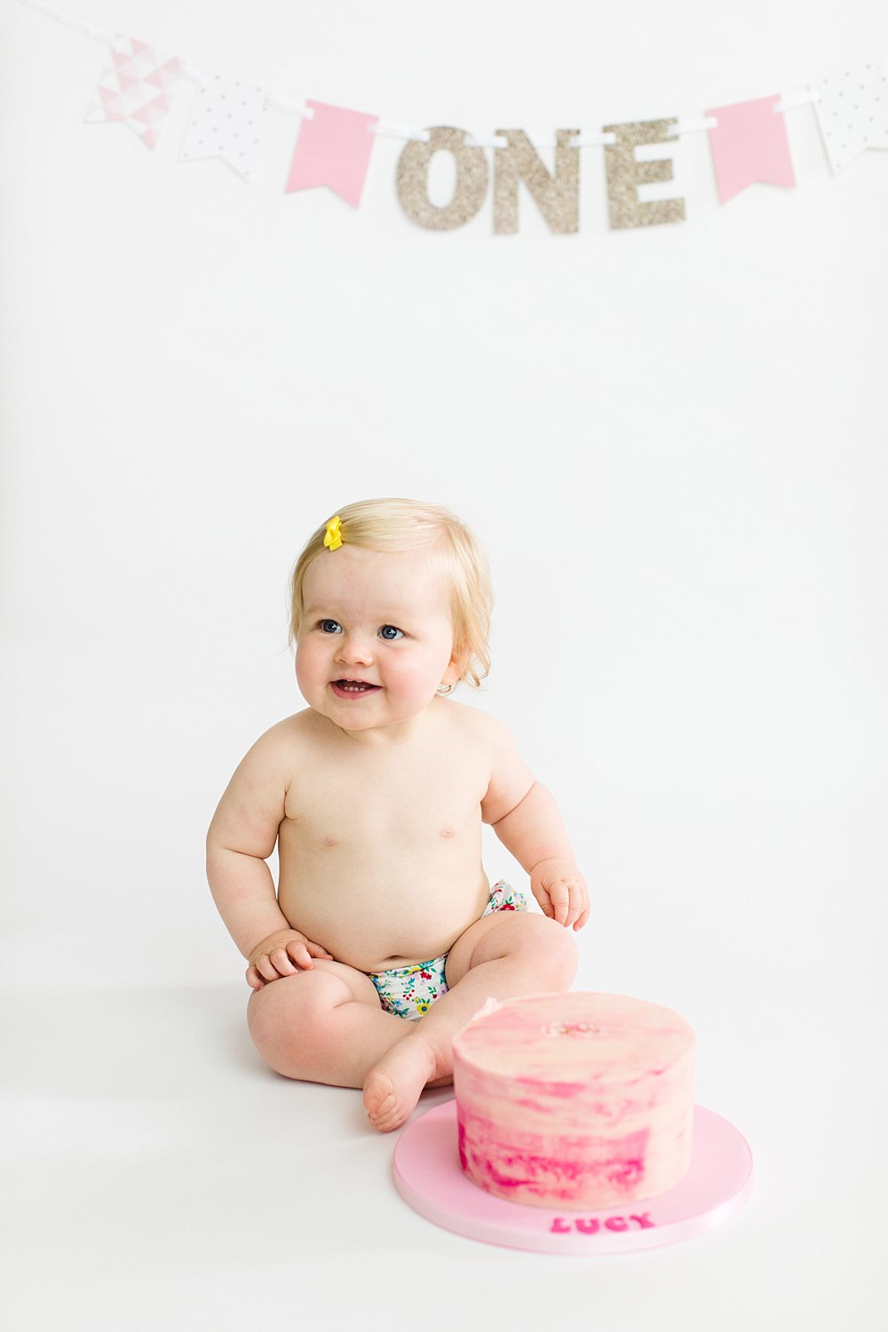 lucy cake smash one year old shoot_-7.jpg